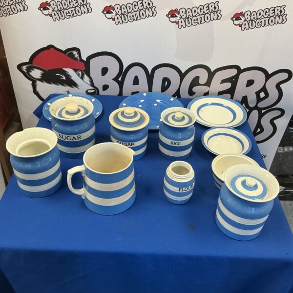 Vintage Cornish pottery jars in blue and white for kitchen storage.