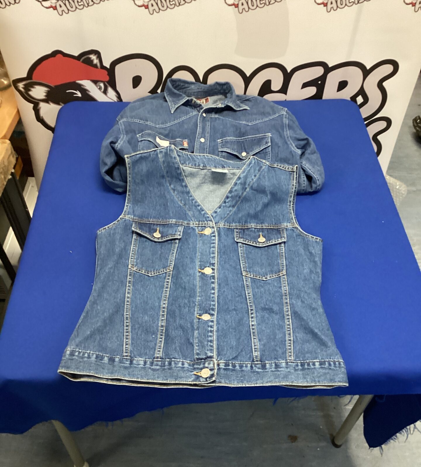 Vintage denim waistcoat with button-up front, classic western style.