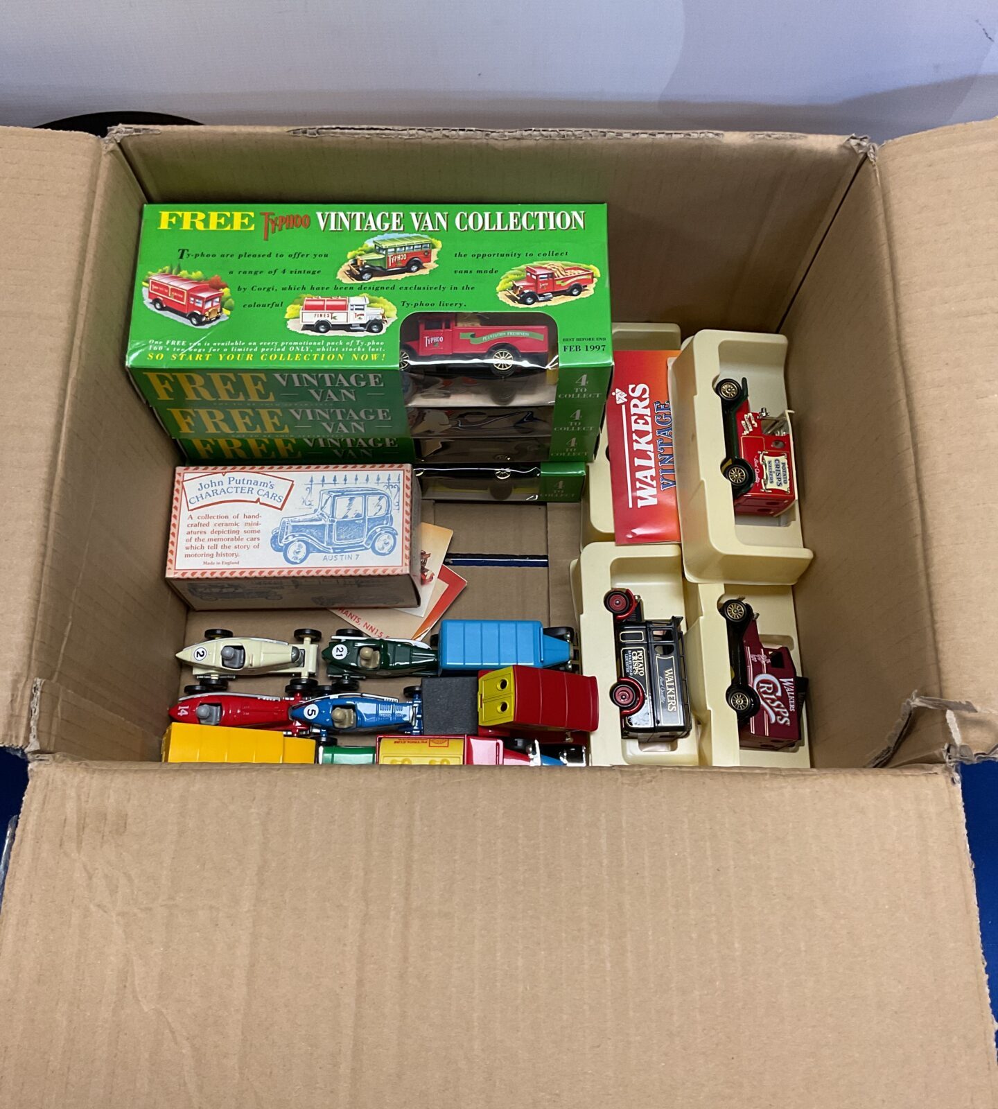 Vintage diecast toy car lot including Corgi and Lesney models.