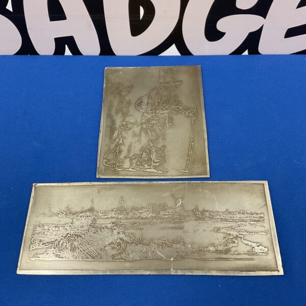 Vintage Dutch steel engraving plate with detailed design.