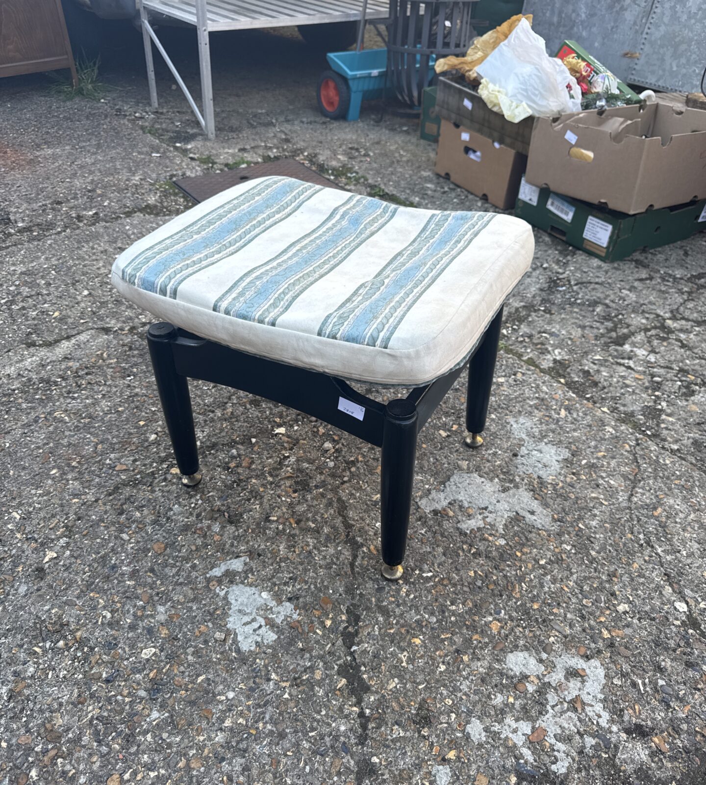 Vintage 1970s E Gomme footstool with patterned fabric.