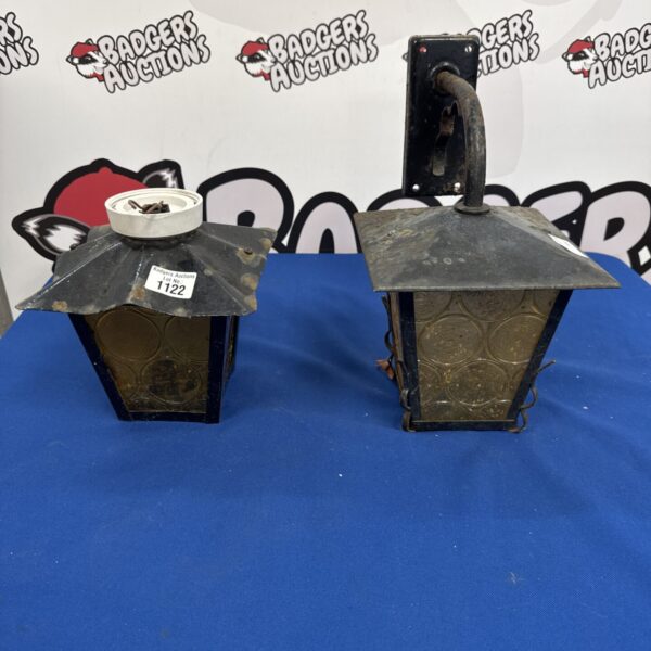 Pair of vintage electric lanterns with dark metal finish.