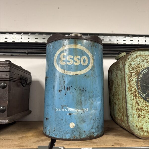 Vintage Esso 5 gallon drum with iconic logo, a collectible petroliana item.