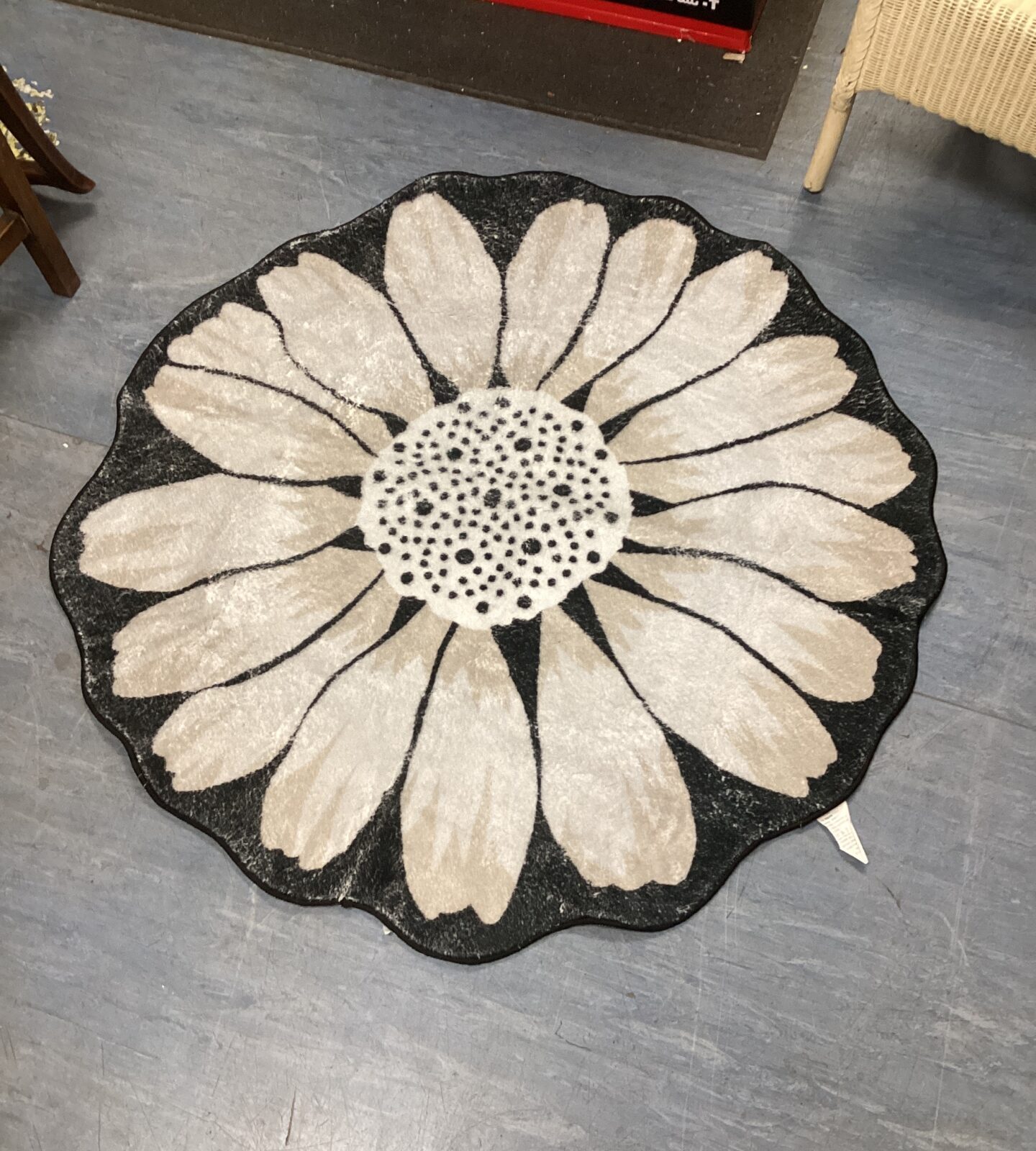 Vintage flower rug with a bold floral pattern.