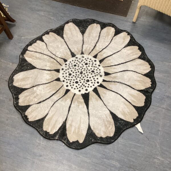 Vintage flower rug with a bold floral pattern.