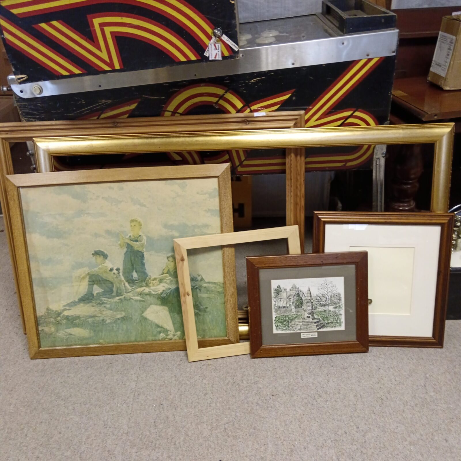 Bundle of vintage framed prints for antique wall decor.