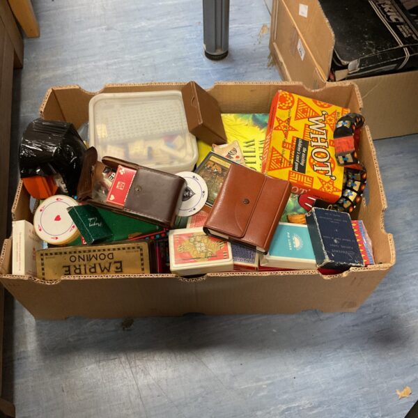 Overview of a vintage games lot with playing cards and Lego.