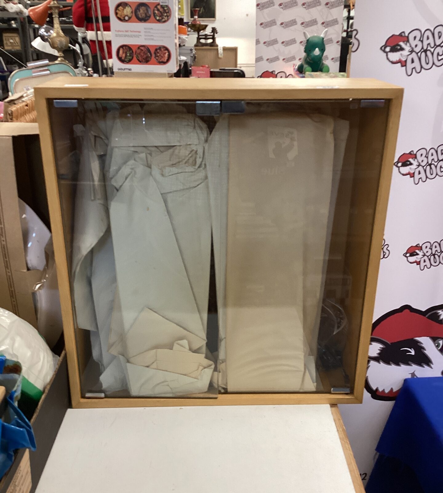 Vintage glass display cabinet for collectibles and display.
