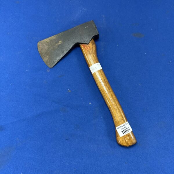 Vintage hand axe with wooden handle and metal head.