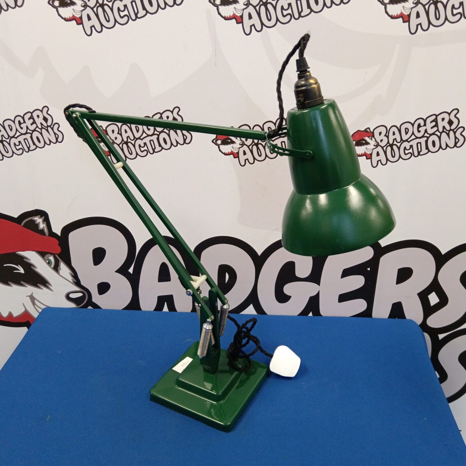Vintage Herbert Terry Anglepoise desk lamp in green, adjustable task lighting.