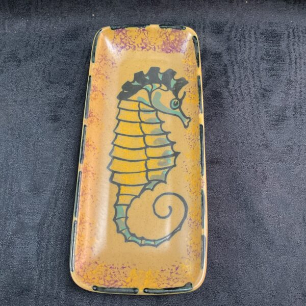Vintage Honiton seahorse dish with detailed illustration.