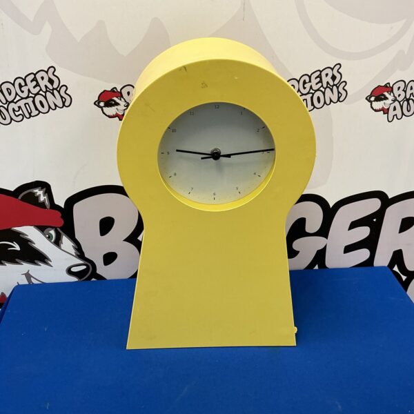 Vintage IKEA metal clock from the 1980s, a retro wall clock.