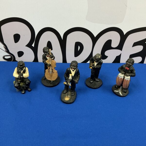 Vintage jazzmen figurines set, ceramic band playing instruments.