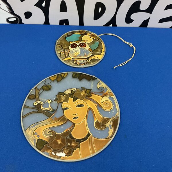 Vintage circular leaded glass window panel with colourful glass.