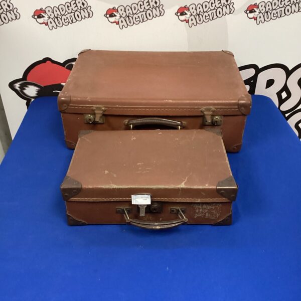 Two vintage brown leather briefcases with python skin detail.