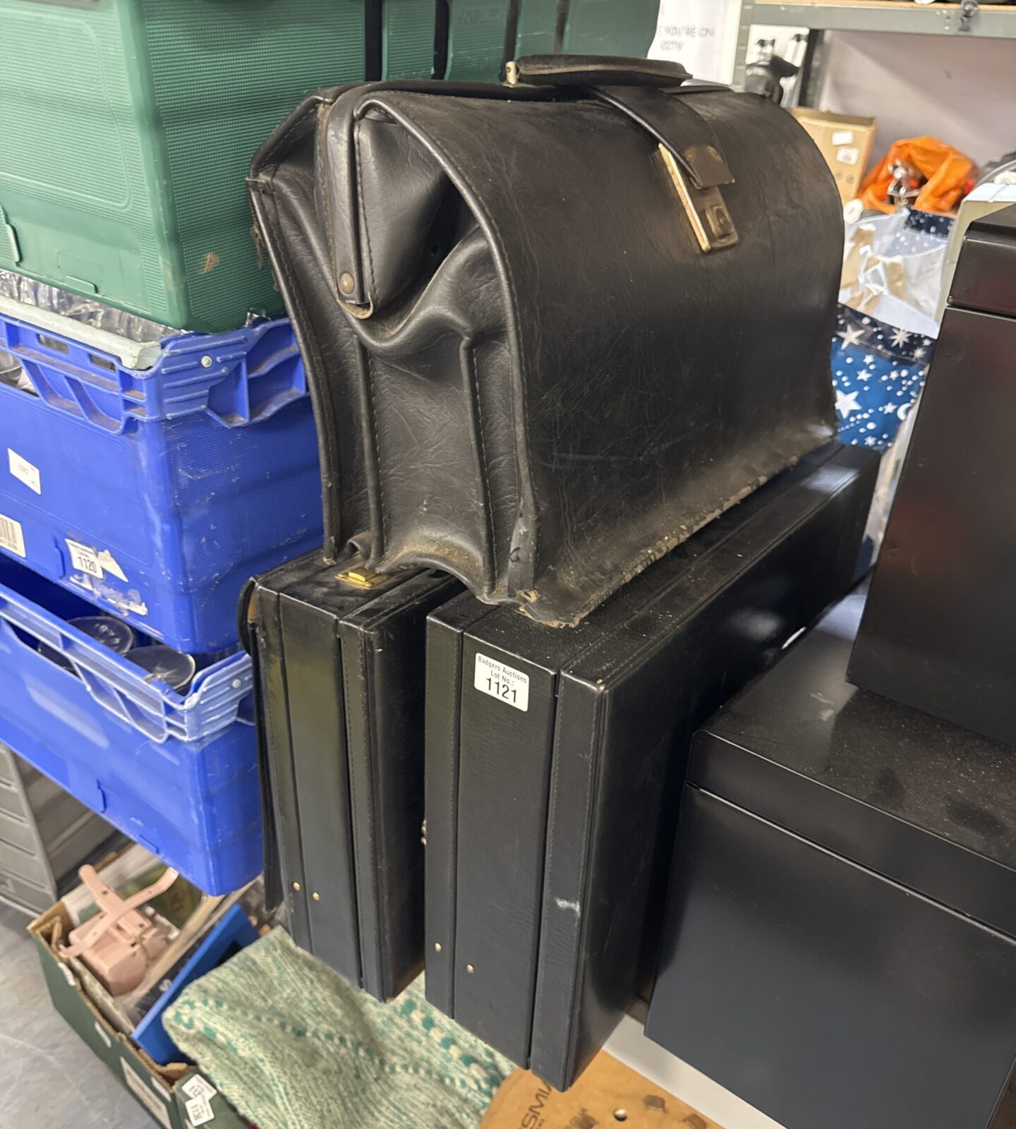 Lot of three vintage leather briefcases in good condition.