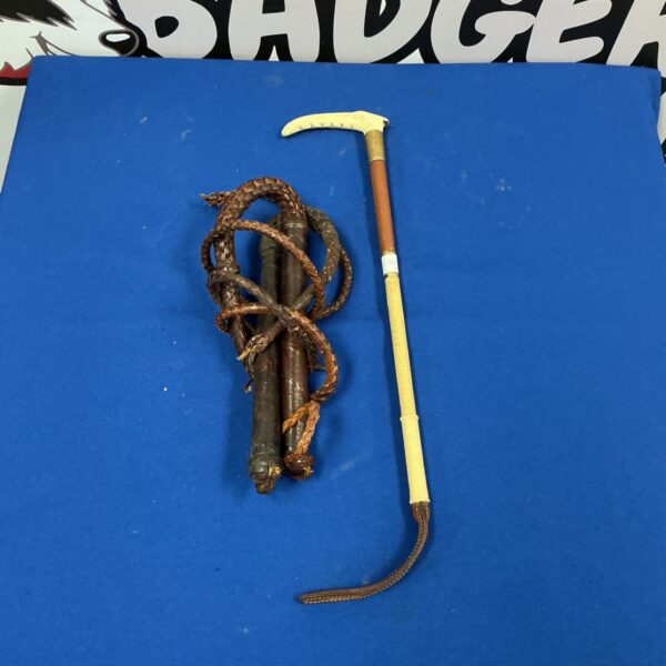Vintage leather whips and riding crop lot for collectors.