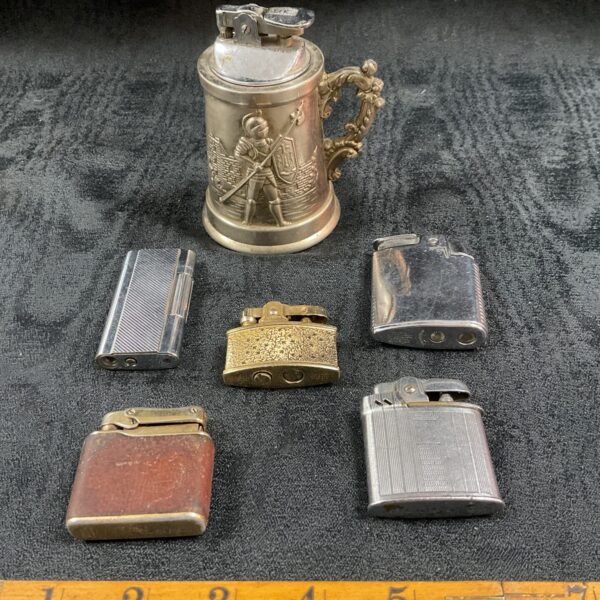 Vintage lighters lot including Colibri and Ronson brands.