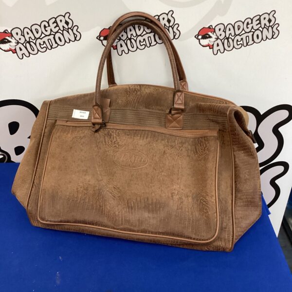 Vintage lizard skin jolly bag, a retro handbag.