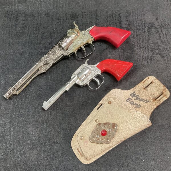 Vintage Lone Star cap guns with Wyatt Earp holster set.