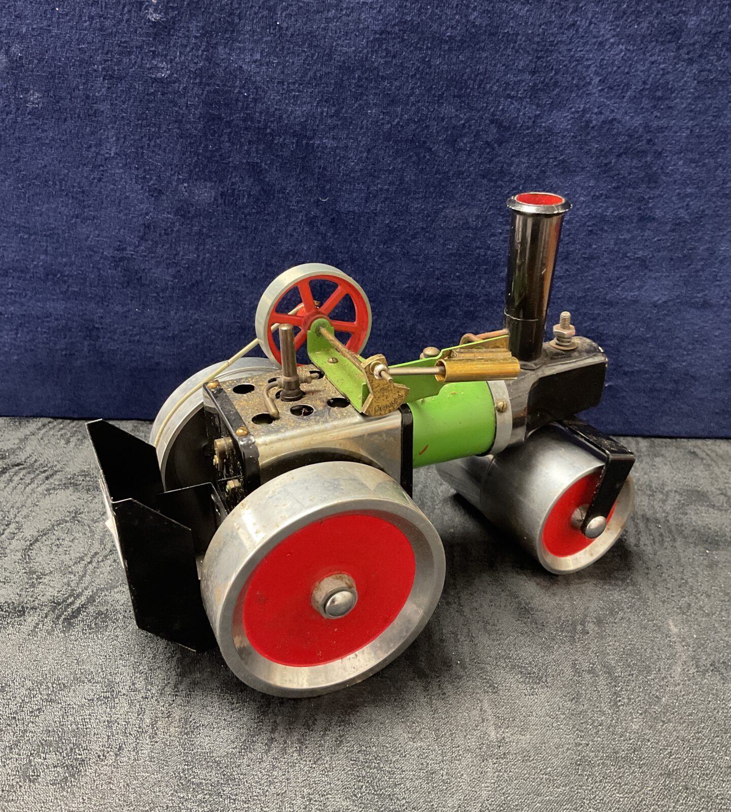 Front view of a vintage Mamod steam roller model steam engine.