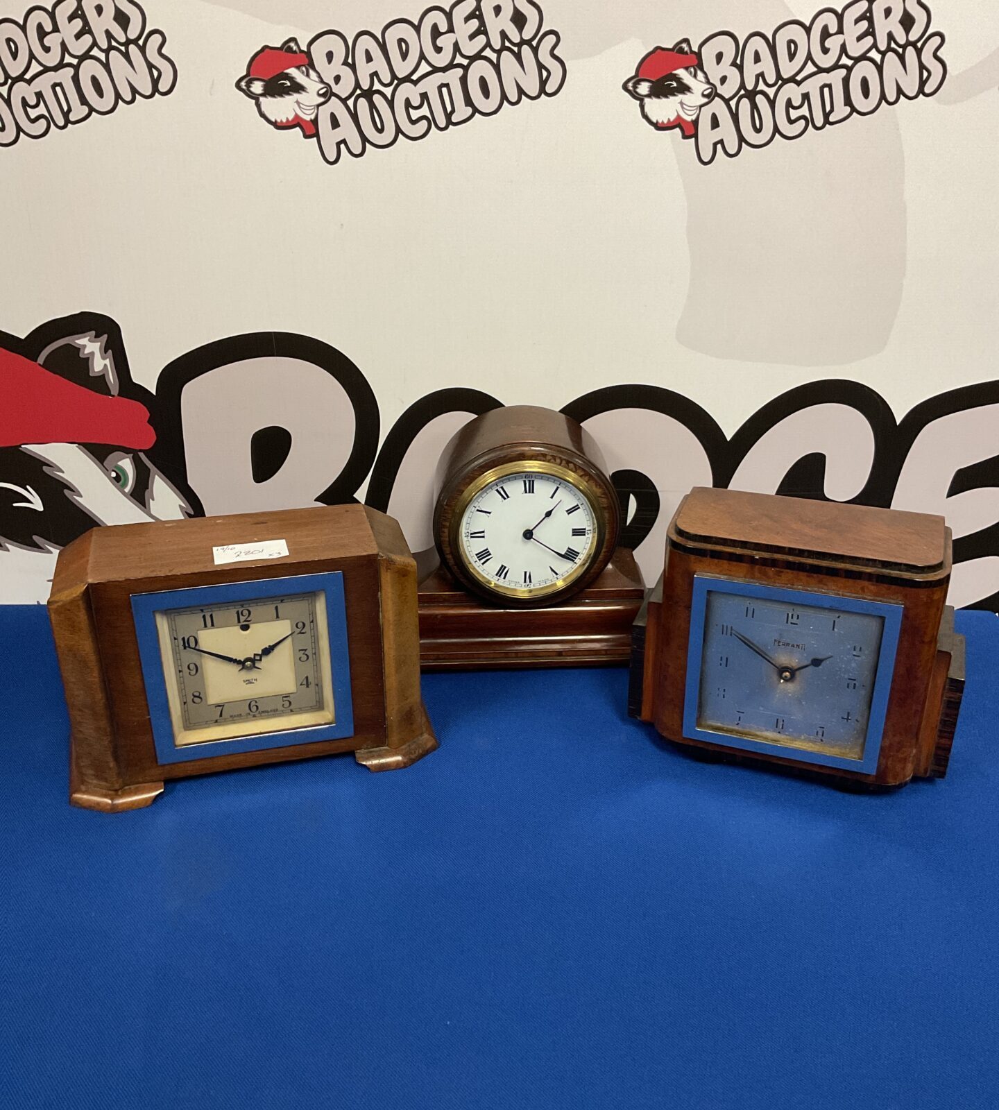 Vintage mantle clocks including Smiths Sectric and Ferranti, collectible timepieces.