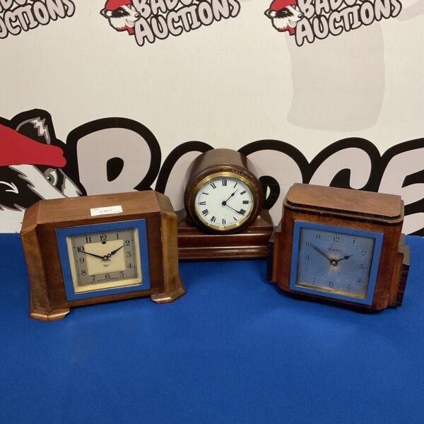 Vintage mantle clocks including Smiths Sectric and Ferranti, collectible timepieces.