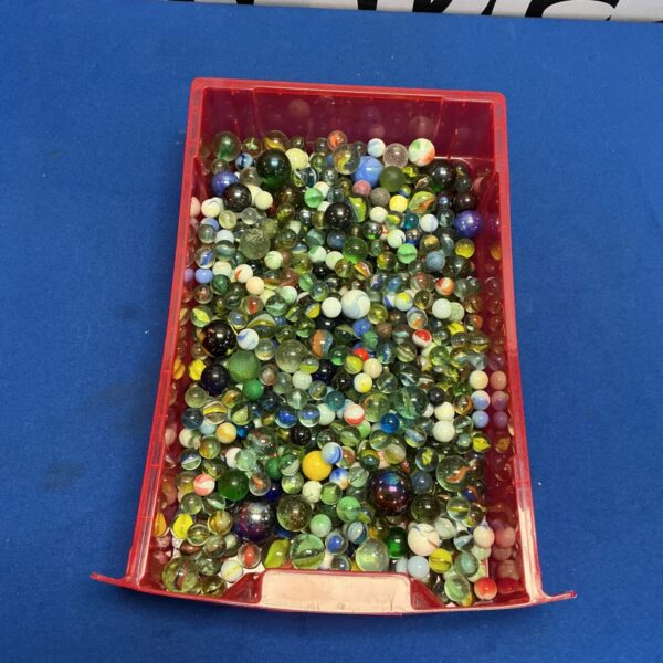 Close-up of a colourful lot of vintage glass marbles.