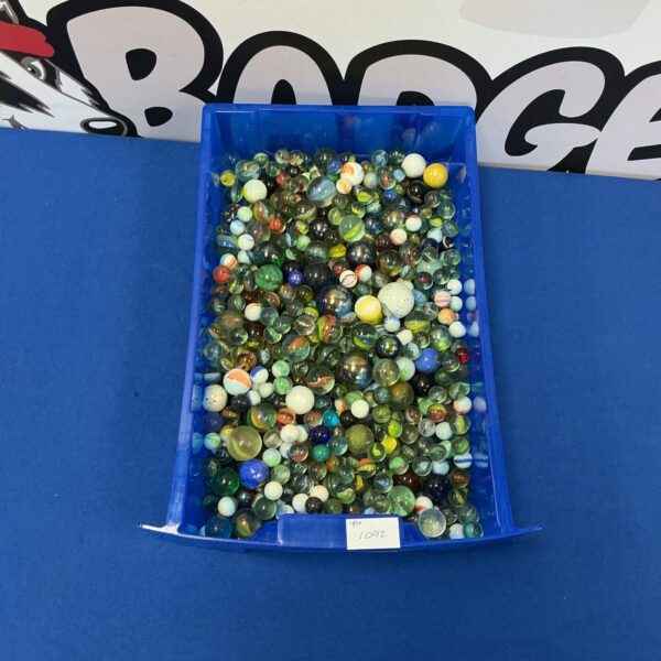 Tray of colourful vintage glass marbles for collectors.