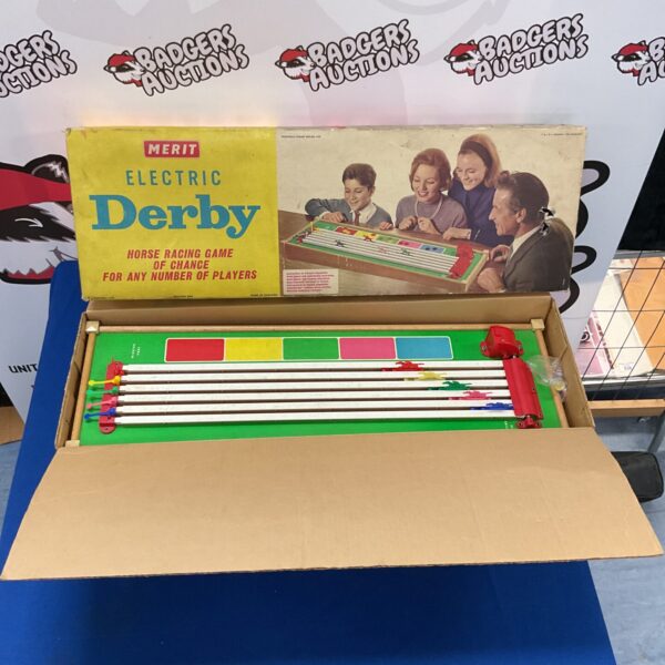 Vintage Merit Electric Derby horse racing game on a patterned surface.