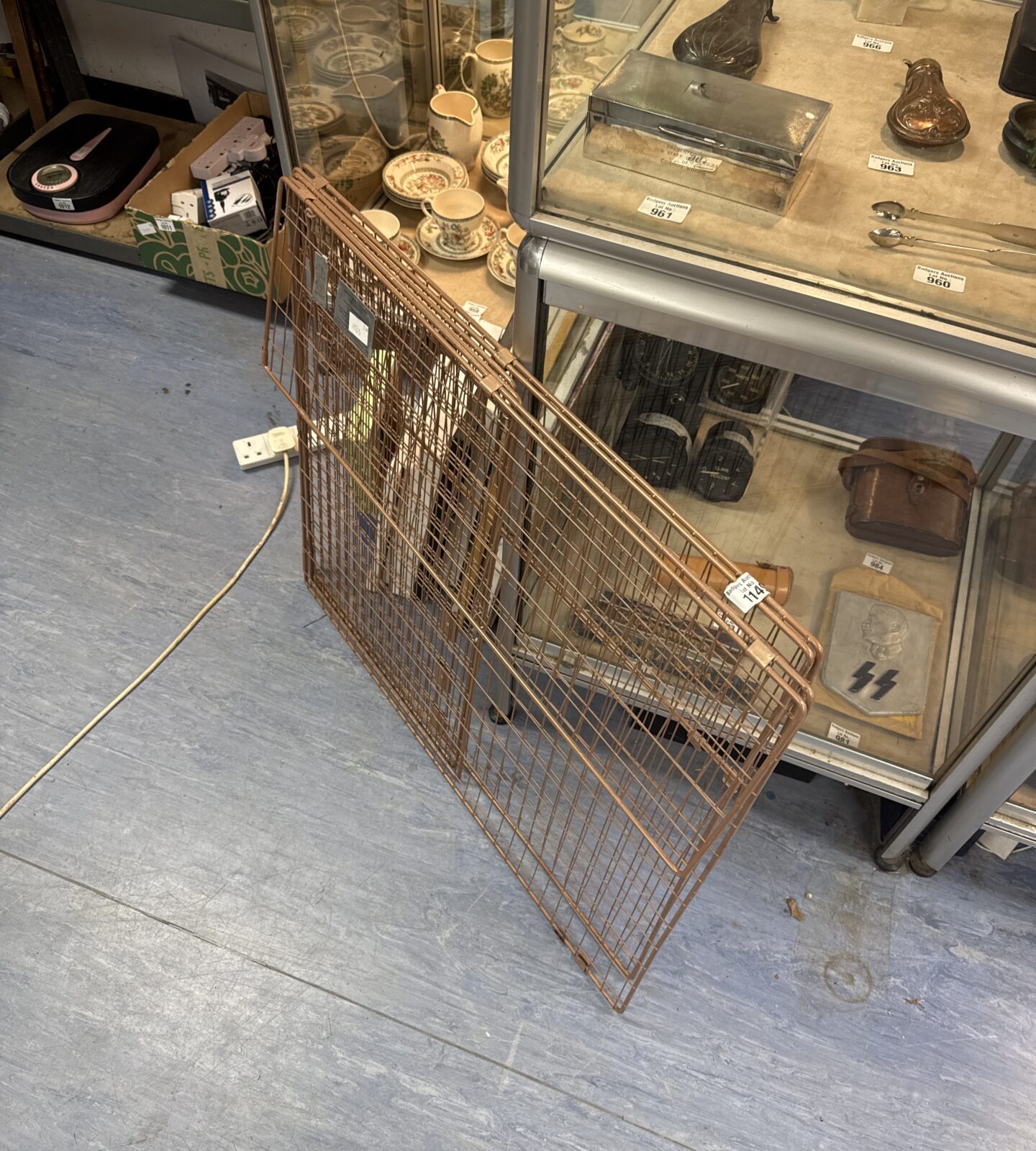 Vintage metal fire guard for fireplace safety and protection.