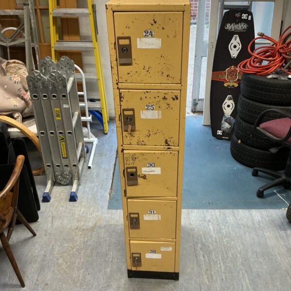 Vintage metal locker set with key locks, industrial storage solution.