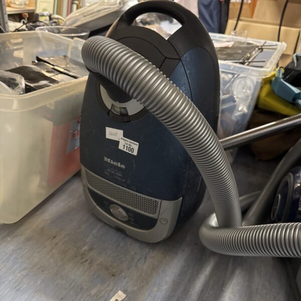 Vintage Miele solution stowaway Hoover for home cleaning.