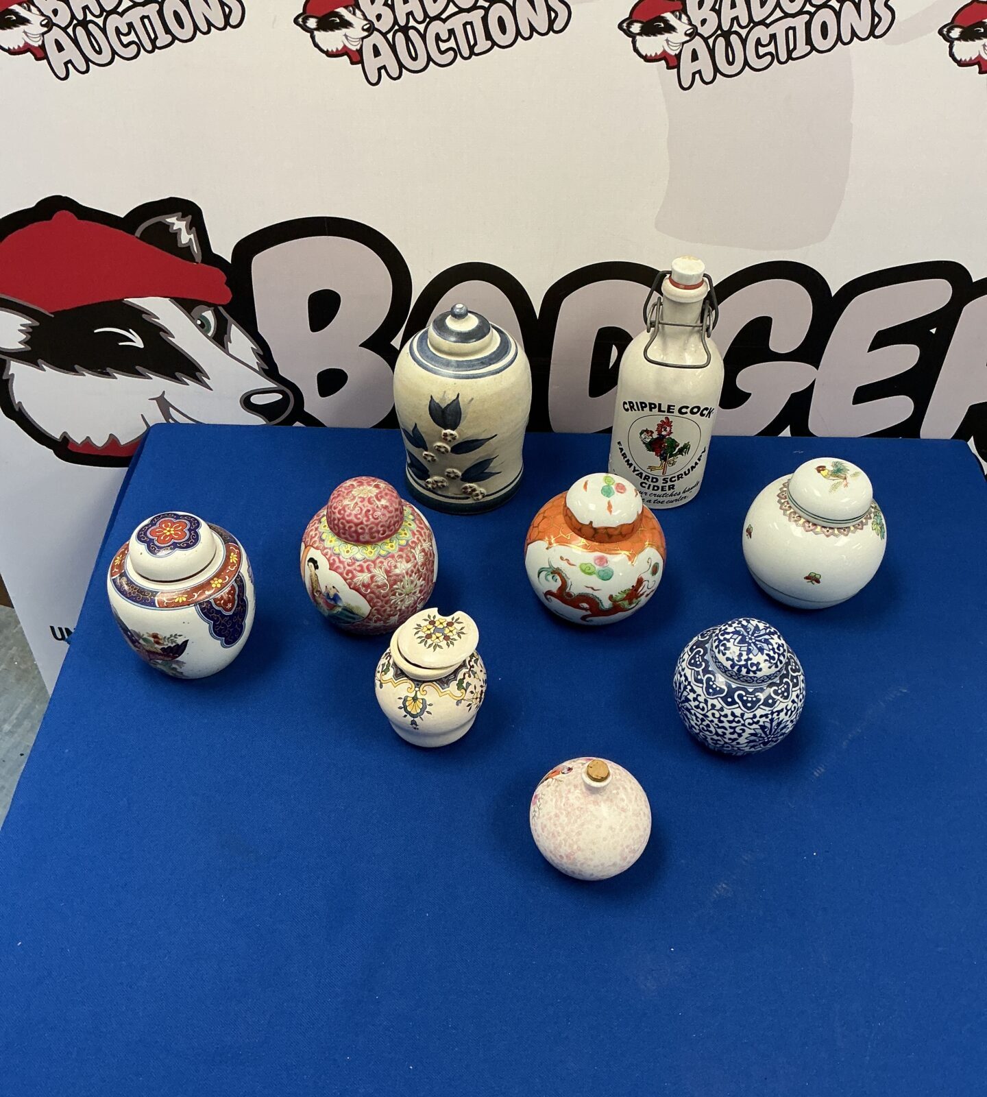 Vintage miniature ginger jar collection with floral designs.