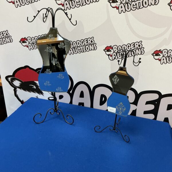 Pair of vintage mirrored jewellery hangers for display.