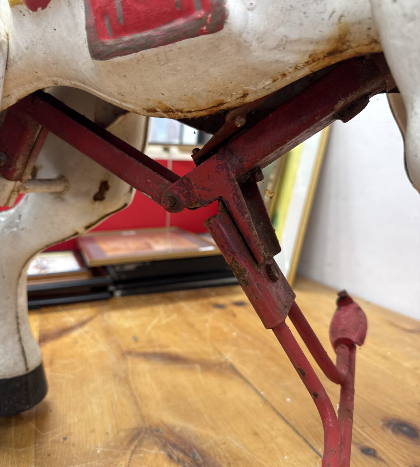Close-up of the red tail of a vintage Mobo ride-on horse.