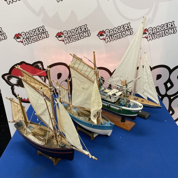 Lot of four vintage model sailing ships for collectors.