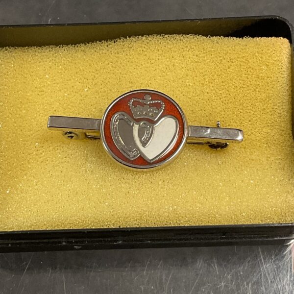 Vintage 1950s NHS blood donor badge with red enamel heart.