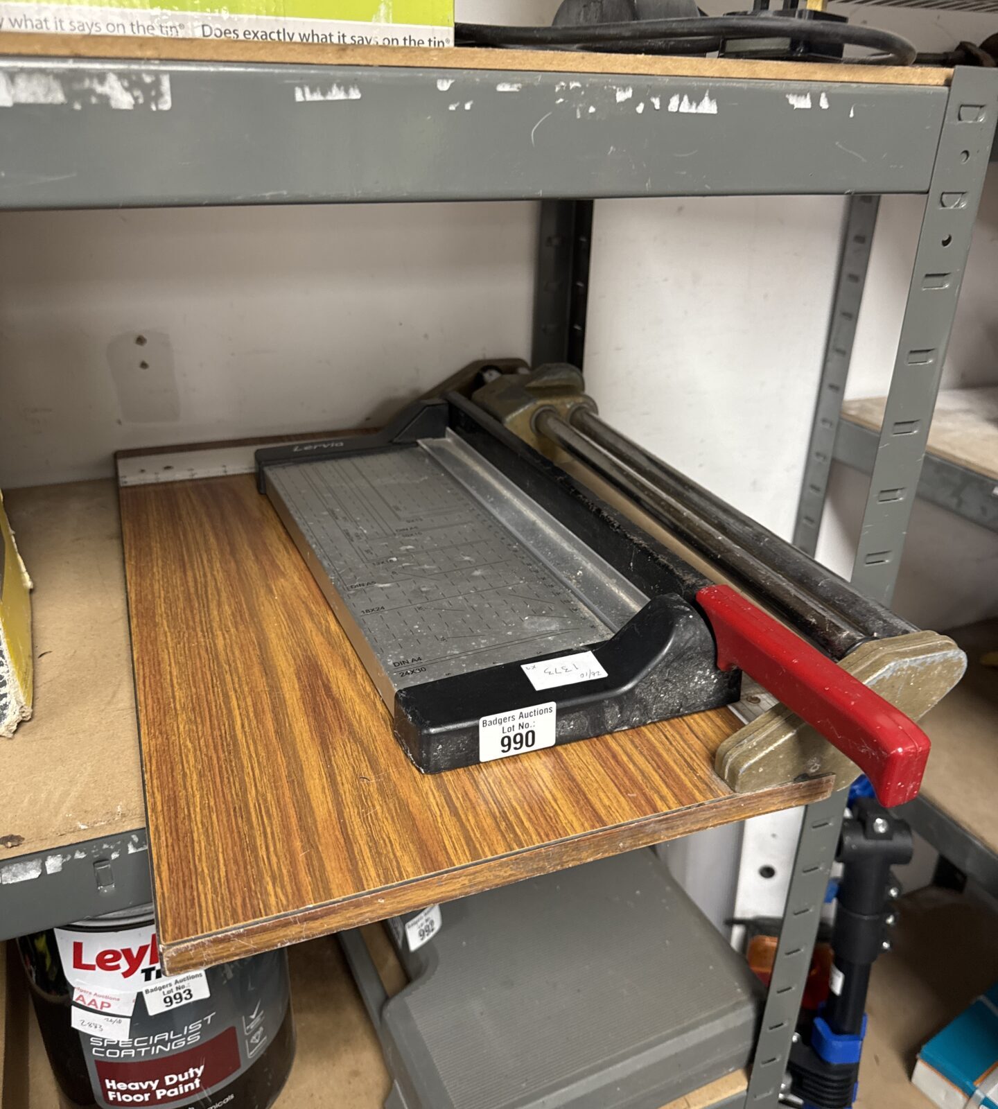 Vintage rotary paper guillotine for office use.