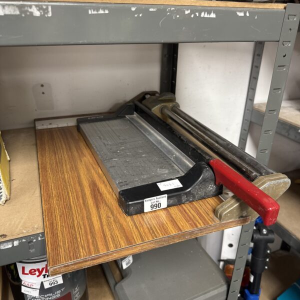 Vintage rotary paper guillotine for office use.