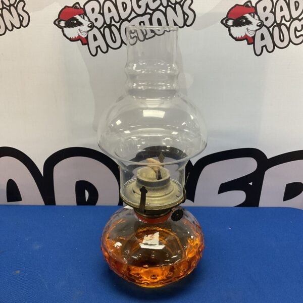Vintage amber glass paraffin lamp for farmhouse lighting.