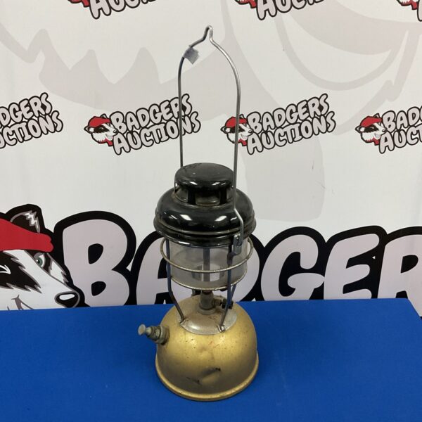 Vintage paraffin lantern with a colourful enamel shade.