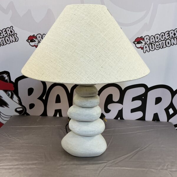 Vintage pebble table lamp with ceramic base for bedside or living room.