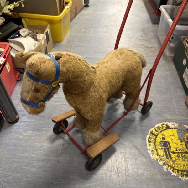 Vintage Pedigree ride-on horse in good condition.