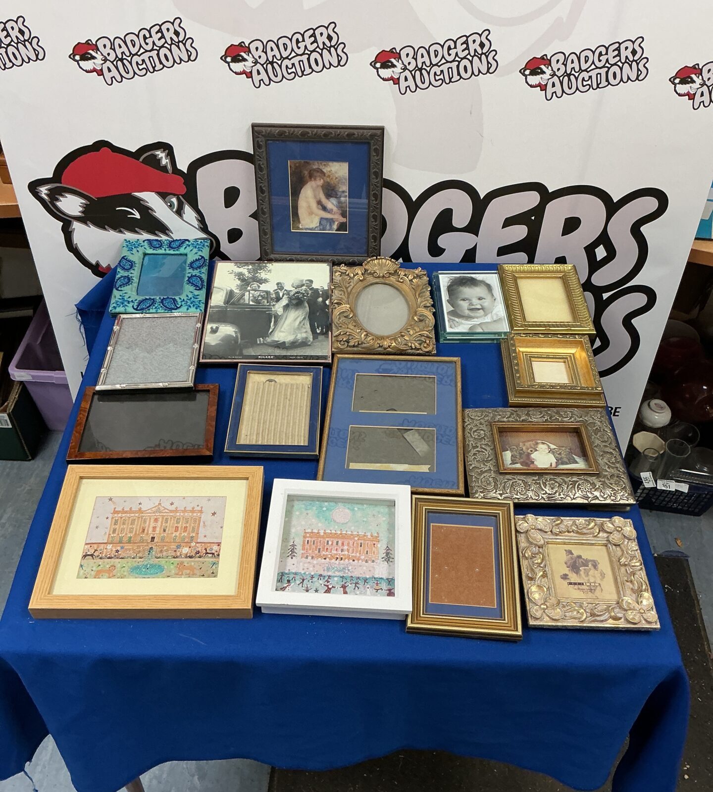 Assorted vintage photo frames in a variety of styles and sizes.