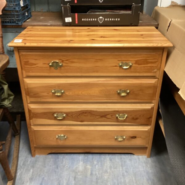 Vintage pine chest of drawers with four drawers.