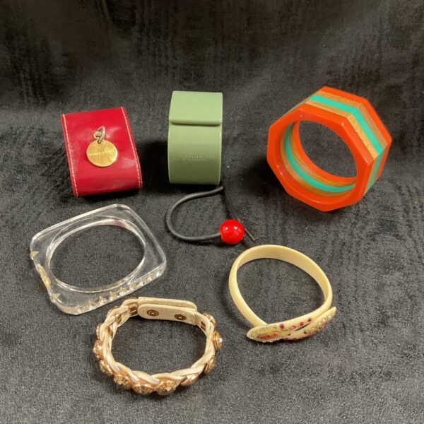 Vintage lot of colourful plastic bracelets including Furla and Tanner Kroll.