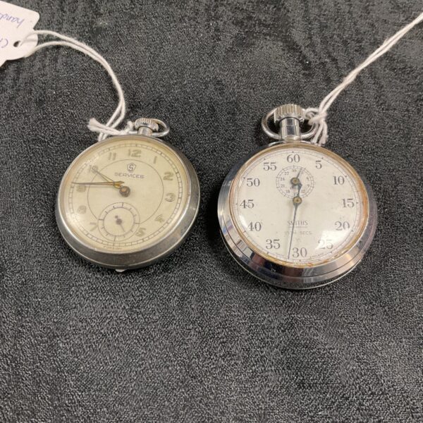 Vintage pocket watch and Smiths stopwatch set for collectors.