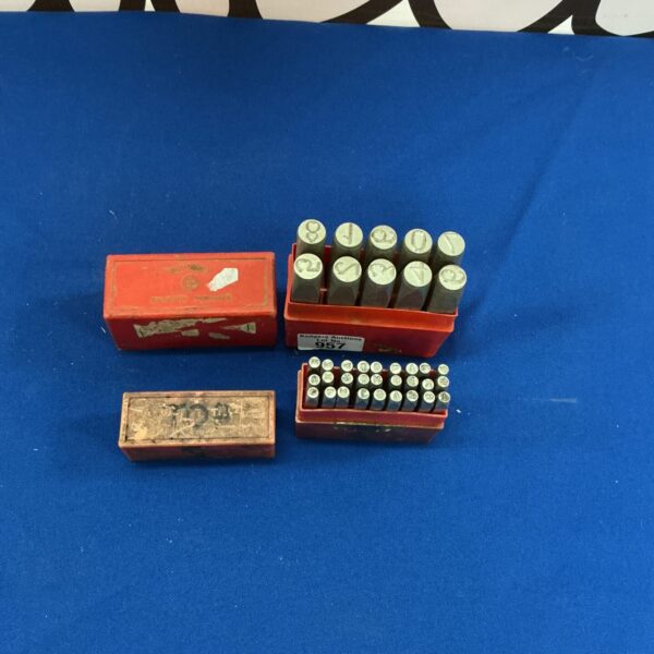 Vintage Priority Marker Punches in wooden case.