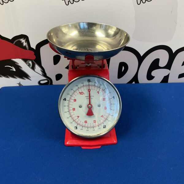 Vintage red Salter kitchen scales with stainless steel pan.